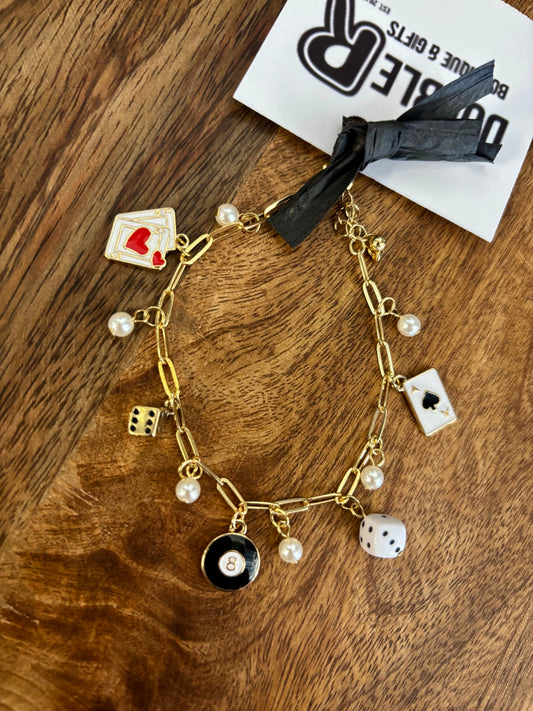 Dealings Done Charm Bracelet