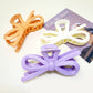 Matte Color Ribbon Shaped Hair Claw Clip: Assorted Color / ONE SIZE(12)